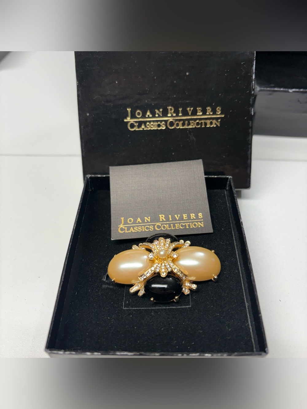 Joan Rivers Gold-Tone Brooch with Cream Pearls and Black Cabochon